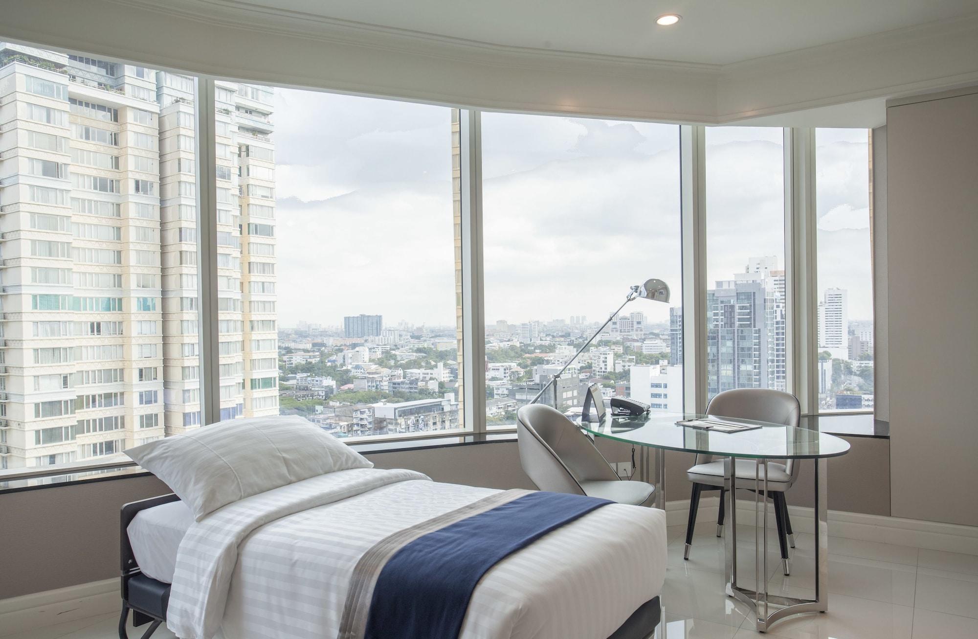 جراند سنتر بوينت سوكومفيت 55 ثونغ لو - SHA Plus بانكوك المظهر الخارجي الصورة A bedroom at the hotel